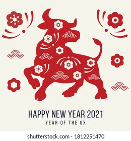 Happy new year 2021 festive banner with ox. Red paper cut buffalo with floral asian pattern. Greeting card with oriental elements with craft style on background. Winter holiday vector illustration.