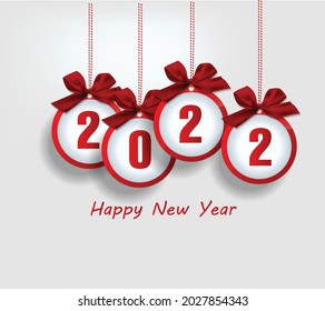 Feliz año nuevo 2022. Números brillantes dorados con confeti y cintas sobre fondo negro. Diseño de tarjetas de felicitación de vacaciones.