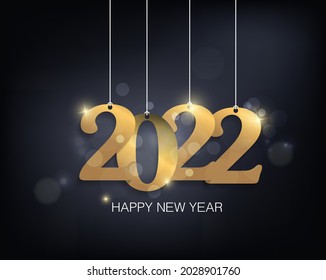 Feliz año nuevo 2022. Números brillantes dorados con confeti y cintas sobre fondo negro. Diseño de tarjetas de felicitación de vacaciones.