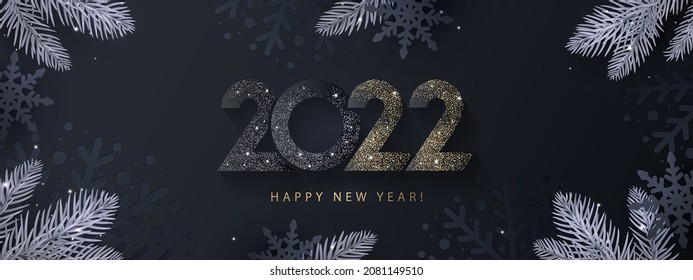 Happy New Year 2022 banner, card, cover. Christmas sparkling design of numbers 2022 on Dark elegant background with frame made of black paper cut snowflakes, beautiful pine branches and shining snow