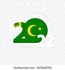 Happy New Year 2022 for Cocos Islands on snowflake background. Greeting Cocos Islands with new 2022 year.