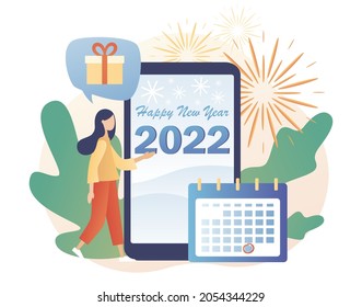 Happy New year 2022 - text on smartphone screen. Christmas holiday. Tiny woman celebrate, greeting friends and family. Modern flat cartoon style. Vector illustration on white background