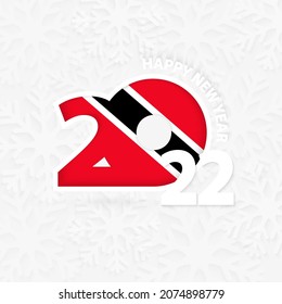 Happy New Year 2022 for Trinidad and Tobago on snowflake background. Greeting Trinidad and Tobago with new 2022 year.