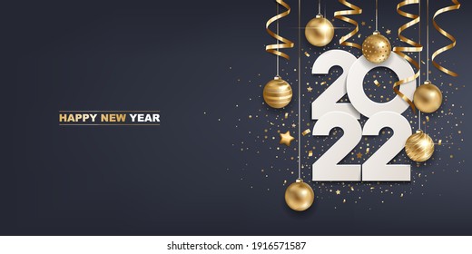 Happy new year 2022. White paper numbers with golden Christmas decoration and confetti on  dark blue background. Holiday greeting card design.
