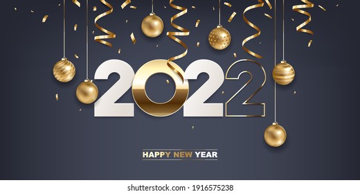 Happy new year 2022. White paper and golden numbers with Christmas decoration and confetti on dark blue background. Holiday greeting card design.