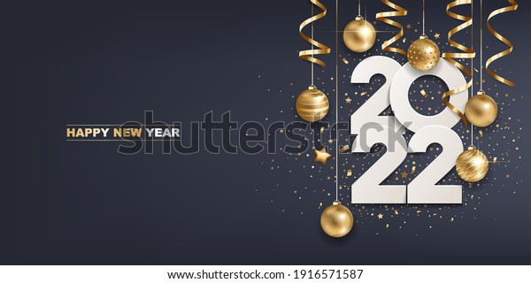 Happy new year 2022. White paper numbers with\
golden Christmas decoration and confetti on  dark blue background.\
Holiday greeting card\
design.\
