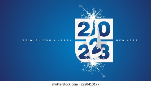 Happy New Year 2023 greeting card design template on blue background. New Year 2023 start concept. Calendar pages with 2023 turn in the wind and the new year begins