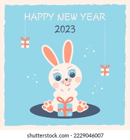 Happy New Year 2023. Year of the rabbit. A cute rabbit with a gift sits on the lawn. Greeting card. Vector illustration.