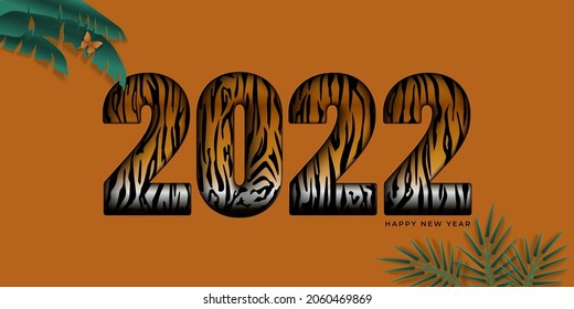 Alles Gute zum Neujahr auf abstraktem Hintergrund. Papierschnitt 2022 Zahlen mit Tigerflecken, tropische Blätter auf orangefarbenem Hintergrund