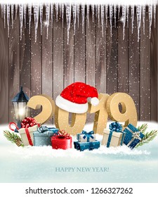 Happy new year background with a 2019 and a gift boxes. Vector.