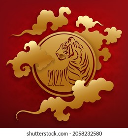 Happy new year background with clouds and golden tiger carved in circle medallion on a red patterned backdrop