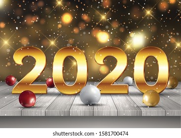 Happy New Year background with golden letters on a wooden table