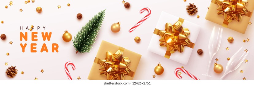 Happy New Year banner,  Xmas sparkling gold star with gifts box and golden tinsel realistic glasses. Horizontal Christmas posters, greeting cards, headers, website. Objects viewed from above. Flat lay