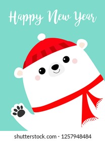 Happy New Year. Big white polar bear waving hand paw print. Red winter hat, scarf. Merry Christmas. Cute cartoon funny kawaii baby character. Greeting Card. Flat design. Blue background. Vector