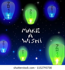 Happy new Year card 2019 greeting card with flying chinese lanterns in the night sky.