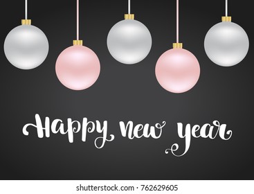 Happy new year card with christmas balls and lettering phrase on dark background