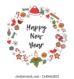 Happy New Year card with festive items. Holiday frame. Greeting card for New Year and Christmas.Christmas hat, acorns, socks, candy canes, snowflakes, mistletoe and ginger cookies.
