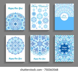 Happy New Year Cards. Vector text on flourish mandala backgrounds. 5 to 7 ratio. Abstract flowers in blue and white. Intricate design elements for print.