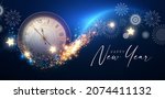 Happy New Year! Countdown. Clock and fireworks, lights and bokeh effect.