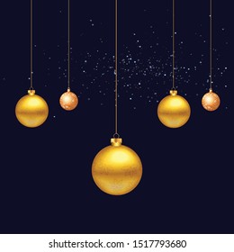 Happy New Year. Gold Christmas balls on black background. Christmas tree bauble decoration