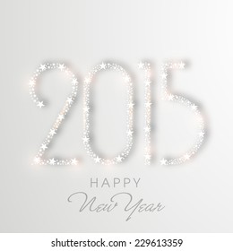 Feliz año nuevo tarjeta de saludo decorada con texto brillante 2015 sobre fondo gris.