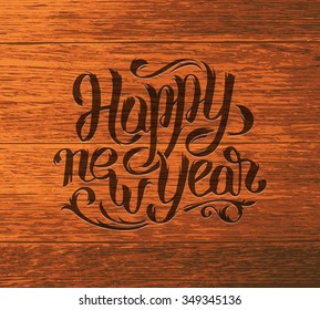Happy New Year greeting card design template with hand lettering text on vintage wood vector background. Festive typography for winter holidays