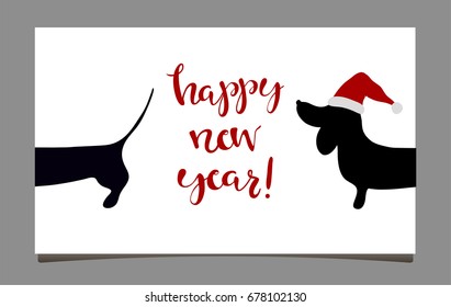 Happy New Year greeting card with dachshund. Symbol of 2018. Hand written lettering Happy New Year.