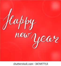 Happy new year greeting. Hand drawn lettering on red background