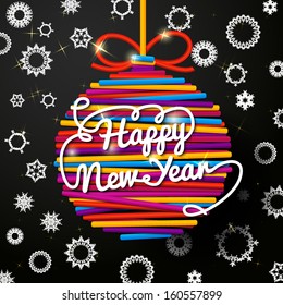 Happy New Year handwritten swirl lettering greeting card on bright lace ball on black paper background with snowflakes . With place for your text. 