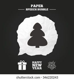 Happy new year icon. Christmas tree and gift box signs. Fireworks explosive symbol. Paper speech bubble with icon.