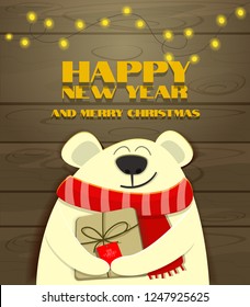 Happy new year and merry Christmas from bear with scarf and present on the background of the tree