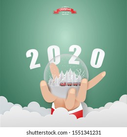 Happy new year Merry Christmas with  with Santa Claus driving Vintage Train runs on the middle of the forest in snow globe on han in winter season ,paper craft style and illustrationhand in wi