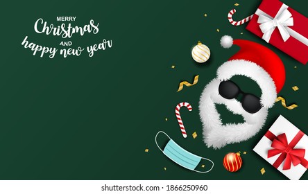 Happy new year and Merry Christmas new normal concept. Design with santa claus hat and medical mask on green background .Vector. illustration.