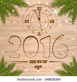 Happy New Year. Merry Christmas Greeting Card with clock  and branches of spruce on a wooden background.
