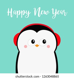Happy New Year. Penguin head face. Red headphones hat. Merry Christmas. Cute cartoon kawaii baby character. Arctic animal. Flat design. Hello winter. Blue background. Vector illustration