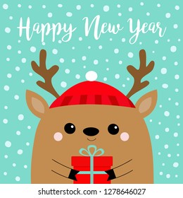 Happy New Year. Raindeer deer head face holding gift box. Red hat, nose, horns. Merry Christmas. Cute cartoon kawaii baby character. Funny animal. Flat design. Hello winter Blue snow background Vector