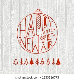 Happy new year. Red text on wooden background