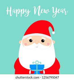 Happy New Year. Santa Claus holding gift box. Funny face head. Candy cane. Merry Christmas. Red hat. Moustaches, beard. Cute cartoon funny kawaii baby character. Flat design. Blue background. Vector