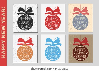 Happy new year. Set of typographical greeting cards with Christmas balls. Element for design