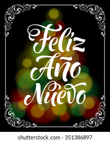 Happy New Year in Spanish: Feliz Ano Nuevo. Vector lettering for invitation, greeting card, prints. Hand drawn inscription, calligraphic holidays design