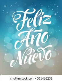 Happy New Year in Spanish: Feliz Ano Nuevo. Vector lettering for invitation, greeting card, prints. Hand drawn inscription, calligraphic holidays design