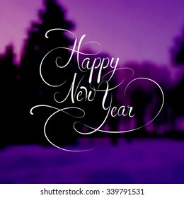 Happy New Year type. Calligraphy text on blurred winter landscape background. 