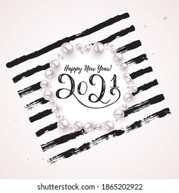 Happy New Year vector card. Pearls and hand lettering 2021 on striped background. Jewel shape for celebration holiday background. Template poster for 2021