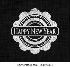 Feliz Año Nuevo escrito en la pizarra