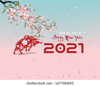 Happy new year2021. Chinese new year 2021 year of the ox , red paper cut ox character,flower and asian elements with craft style on background.