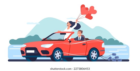 Happy newlywed couple driving convertible on their honeymoon. Man and woman riding in red car on road. Love heart balloons. Wedding celebration. Bride and groom vacation