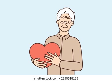 Happy older man holding big heart in hands feeling thankful and grateful. Smiling mature grandfather show love and support. Charity and gratitude. Vector illustration. 