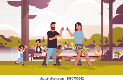 happy parents and children eating hot dogs drinking juice family having picnic weekend concept river bank landscape background flat full length horizontal vector illustration