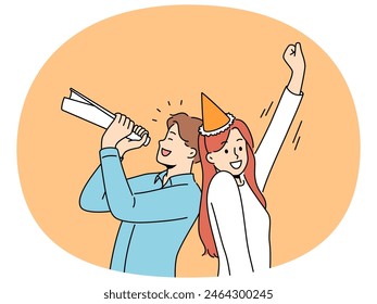 Happy people celebrate birthday or special occasion. Smiling couple in cone on head have fun celebrate Friday dayoff. Party and celebration.