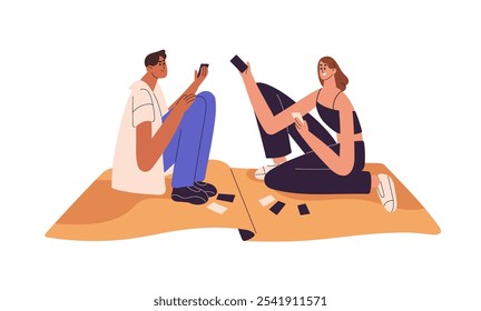 Happy people gambling, play boardgames on blanket. Cute couple spends time together. Friends hold cards in hands, have fun with board games. Flat isolated vector illustration on white background